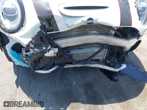 2021 MINI Convertible with VIN WMWWJ9C0XM3M07302, listed as a IAAI auction lot 42027854 with 30,921 mi miles and . Bid and sale history available at DreamBid. Image 6.