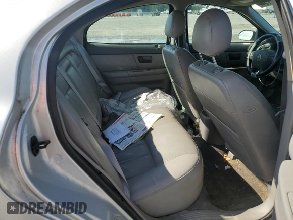 2003 Mercury Sable LS with VIN 1MEHM55S73A619013, listed as a Copart auction lot 73504154 with 200,135 mi miles and Salvage Title. Bid and sale history available at DreamBid. Image 11.