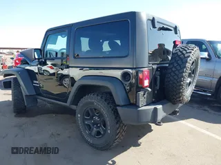 2014 Jeep Wrangler Sport with VIN 1C4AJWAG7EL100344, listed as a IAAI auction lot 42020438 with 87,279 mi miles and . Bid and sale history available at carsss.com. Image 3.