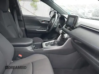 2022 Toyota RAV4 Hybrid SE with VIN JTM16RFV7ND067284, listed as a IAAI auction lot 42637821 with 20,512 mi miles and . Bid and sale history available at DreamBid. Image 5.