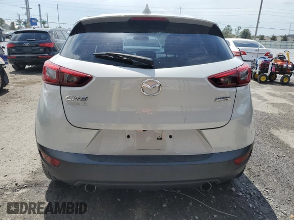 2017 Mazda CX-3 Touring z VIN JM1DKDC78H0150588, wystawiony jako Copart lot #55284205 z przebiegiem 78 923 mil mil oraz Szkoda całkowita • Salvage title. Historia ofert i sprzedaży dostępna na DreamBid. Obrazek 6.