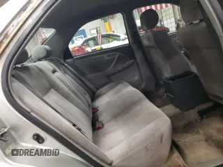 2000 Toyota Camry CE z VIN JT2BG22K1Y0483646, wystawiony jako Copart lot #53129705 z przebiegiem 187 418 mil mil oraz Szkoda całkowita • Salvage title. Historia ofert i sprzedaży dostępna na DreamBid. Obrazek 10.