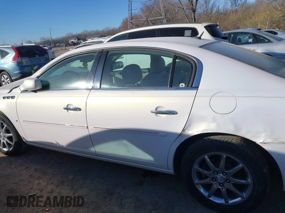 2007 Buick Lucerne CXL with VIN 1G4HD57267U151936, listed as a IAAI auction lot 41026592 with 144,710 mi miles and . Bid and sale history available at DreamBid. Image 14.