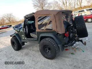 2005 Jeep Wrangler X with VIN 1J4FA39S75P308465, listed as a Copart auction lot 48693035 with Not Provided miles and Salvage Title. Bid and sale history available at DreamBid. Image 2.