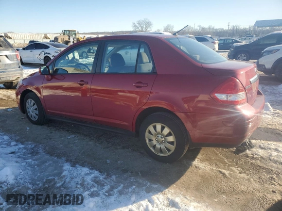 2009 Nissan Versa 1.8 S with VIN 3N1BC11E39L400203, listed as a Copart auction lot 88673145 with 105,578 mi miles and Salvage Title. Bid and sale history available at carsss.com. Image 2.