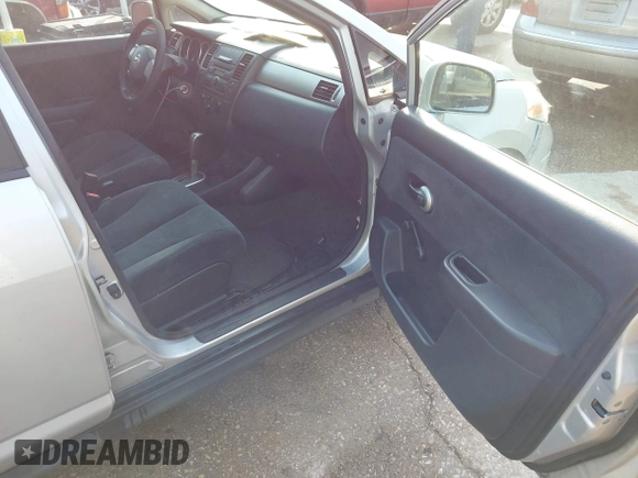 2010 Nissan Versa 1.8 SL with VIN 3N1BC1CP9AL415758, listed as a IAAI auction lot 42021539 with 13,826 mi miles. Bid and sale history available at carsss.com. Image 5.