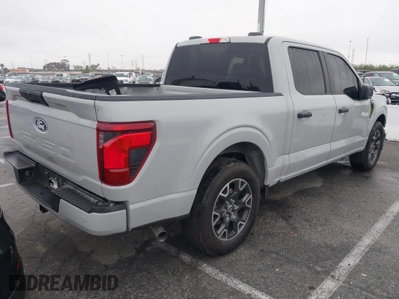 2024 Ford F-150 STX with VIN 1FTEW2KP7RFA29709, listed as a IAAI auction lot 41915128 with 5,883 mi miles and . Bid and sale history available at carsss.com. Image 4.