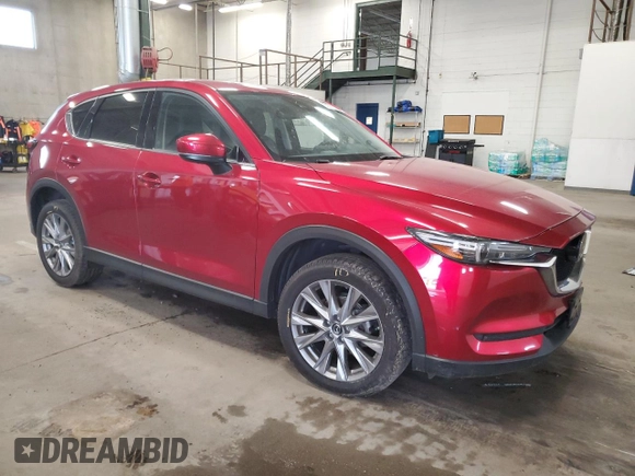 2020 Mazda CX-5 Grand Touring with VIN JM3KFBDM9L0760861, listed as a Copart auction lot 60977275 with 58,608 mi miles and Salvage title. Bid and sale history available at DreamBid. Image 4.