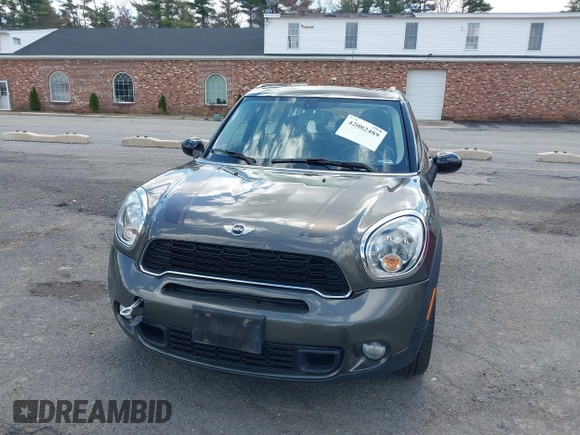 2014 MINI Countryman S with VIN WMWZC3C58EWP27041, listed as a IAAI auction lot 42082489 with 77,749 mi miles and . Bid and sale history available at DreamBid. Image 6.
