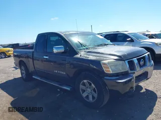 2005 Nissan Titan XE with VIN 1N6BA06A15N560400, listed as a IAAI auction lot 41656560 with 212,568 mi miles. Bid and sale history available at carsss.com. Image 13.