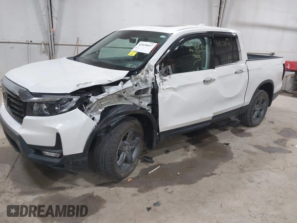 2022 Honda Ridgeline RTL-E z VIN 5FPYK3F76NB033832, wystawiony jako IAAI lot #41838047 z przebiegiem 16 497 mil mil oraz . Historia ofert i sprzedaży dostępna na DreamBid. Obrazek 18.