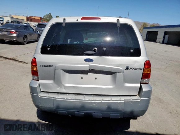2005 Ford Escape Hybrid z VIN 1FMCU96H75KB95718, wystawiony jako Copart lot #60000825 z przebiegiem Nie podano mil oraz Czysty tytuł • Clean title. Historia ofert i sprzedaży dostępna na DreamBid. Obrazek 6.