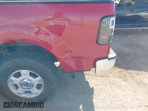 2005 Ford F-150 XLT with VIN 1FTPW12555KD00513, listed as a IAAI auction lot 41885017 with 217,032 mi miles. Bid and sale history available at carsss.com. Image 12.