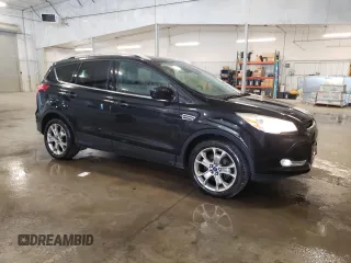 2014 Ford Escape Titanium with VIN 1FMCU9J9XEUE45988, listed as a Copart auction lot 56066175 with 228,872 mi miles and Clean Title. Bid and sale history available at DreamBid. Image 4.
