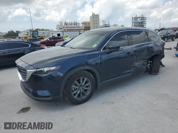 2020 Mazda CX-9 Touring with VIN JM3TCACY1L0423340, listed as a Copart auction lot 57389305 with 64,737 mi miles and Salvage title. Bid and sale history available at DreamBid. Image 1.