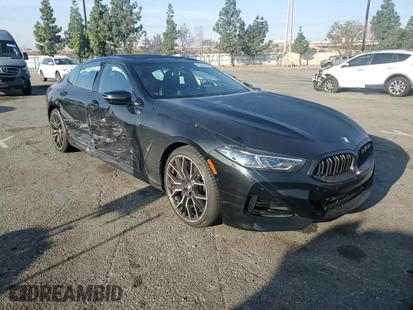 2023 BMW 8 Series 840i with VIN WBAGV2C01PCK95705, listed as a Copart auction lot 83424634 with 23,674 mi miles and Salvage Title. Bid and sale history available at carsss.com. Image 10.