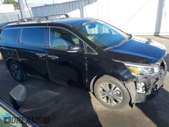 2021 Kia Sedona EX with VIN KNDMC5C10M6671729, listed as a IAAI auction lot 40858206 with 58,775 mi miles. Bid and sale history available at carsss.com. Image 14.