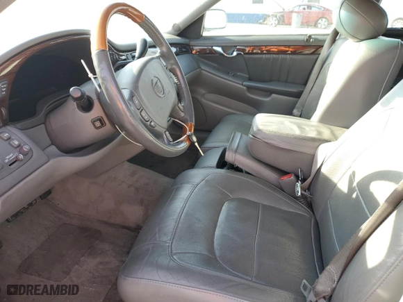 2004 Cadillac DeVille DHS with VIN 1G6KE54Y74U238243, listed as a Copart auction lot 85054564 with 142,652 mi miles and Salvage Title. Bid and sale history available at carsss.com. Image 7.
