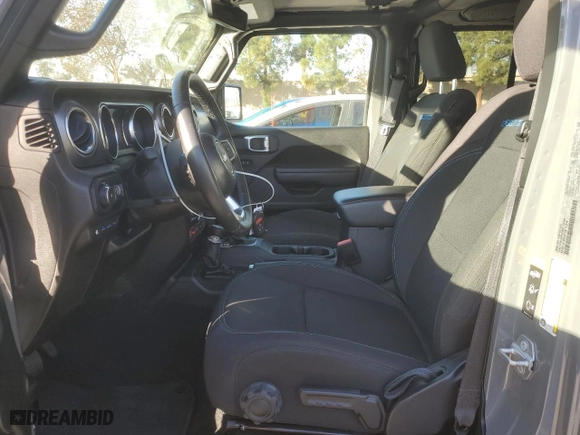 2022 Jeep Wrangler 4xe Unlimited Rubicon with VIN 1C4JJXR62NW172990, listed as a Copart auction lot 85297694 with 29,809 mi miles and Salvage Title. Bid and sale history available at carsss.com. Image 7.