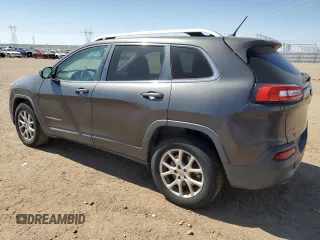 2015 Jeep Cherokee Latitude z VIN 1C4PJMCB2FW734385, wystawiony jako Copart lot #57333805 z przebiegiem 121 249 mil mil oraz Szkoda całkowita • Salvage title. Historia ofert i sprzedaży dostępna na DreamBid. Obrazek 2.