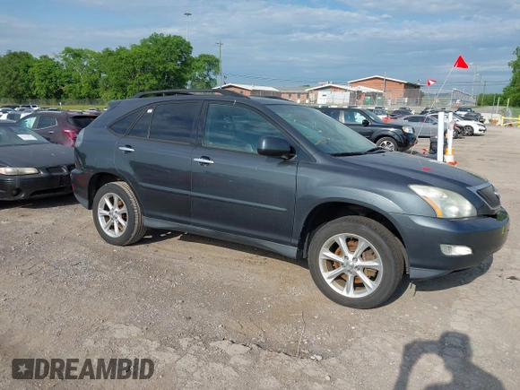 2008 Lexus RX with VIN 2T2HK31U28C063629, listed as a IAAI auction lot 42174790 with 204,595 mi miles. Bid and sale history available at carsss.com. Image 13.