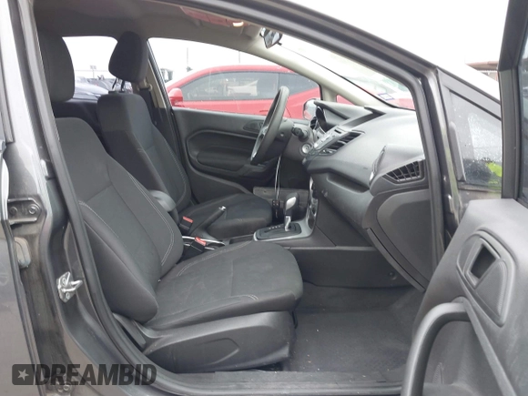 2018 Ford Fiesta SE with VIN 3FADP4BJXJM136232, listed as a IAAI auction lot 41901540 with 119,065 mi miles and . Bid and sale history available at DreamBid. Image 5.