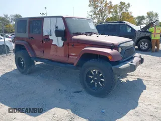 2008 Jeep Wrangler Unlimited Sahara with VIN 1J4GA591X8L537550, listed as a IAAI auction lot 40281739 with 145,388 mi miles and . Bid and sale history available at carsss.com. Image 1.