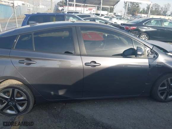 2022 Toyota Prius L Eco with VIN JTDKAMFU2N3168011, listed as a IAAI auction lot 41602356 with 34,977 mi miles. Bid and sale history available at carsss.com. Image 13.