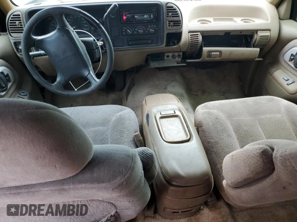 1995 GMC Suburban z VIN 1GKEC16K9SJ708907, wystawiony jako Copart lot #56415125 z przebiegiem 251 343 mil mil oraz Szkoda całkowita • Salvage title. Historia ofert i sprzedaży dostępna na DreamBid. Obrazek 8.