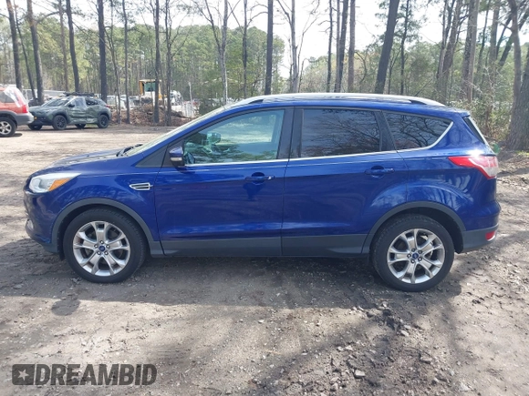 2014 Ford Escape Titanium with VIN 1FMCU9J94EUC38996, listed as a IAAI auction lot 41952267 with 211,375 mi miles. Bid and sale history available at carsss.com. Image 14.