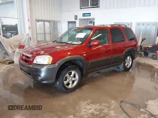 2006 Mazda Tribute S with VIN 4F2YZ06196KM14531, listed as a IAAI auction lot 41594920 with 297,204 mi miles and . Bid and sale history available at carsss.com. Image 2.
