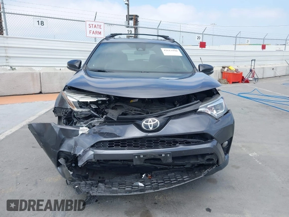 2017 Toyota RAV4 SE with VIN JTMJFREV5HJ155712, listed as a IAAI auction lot 42613998 with 72,112 mi miles and . Bid and sale history available at DreamBid. Image 12.