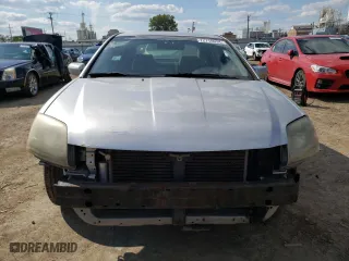 2011 Mitsubishi Galant FE with VIN 4A32B2FF4BE019454, listed as a Copart auction lot 72716034 with 239,676 mi miles and Salvage Title. Bid and sale history available at carsss.com. Image 5.