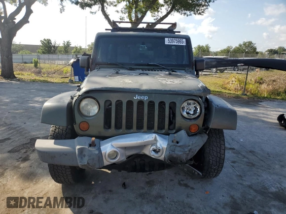 2008 Jeep Wrangler Unlimited Sahara with VIN 1J4GA59198L566019, listed as a Copart auction lot 53975965 with 184,612 mi miles and Salvage Title. Bid and sale history available at carsss.com. Image 5.