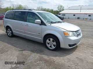 2009 Dodge Grand Caravan SXT z VIN 2D8HN54X39R618734, wystawiony jako IAAI lot #42117973 z przebiegiem 75 863 mil mil oraz . Historia ofert i sprzedaży dostępna na DreamBid. Obrazek 1.