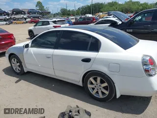 2005 Nissan Altima 2.5 S with VIN 1N4AL11EX5C323608, listed as a IAAI auction lot 41962367 with 160,026 mi miles. Bid and sale history available at carsss.com. Image 14.