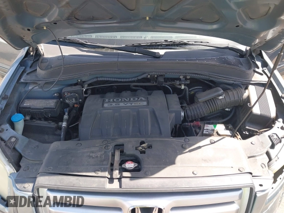 2006 Honda Pilot EX-L with VIN 2HKYF18536H548948, listed as a IAAI auction lot 36572651 with 242,758 mi miles and . Bid and sale history available at DreamBid. Image 10.
