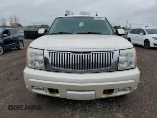 2005 Cadillac Escalade z VIN 1GYEK63N95R204674, wystawiony jako Copart lot #55854175 z przebiegiem 303 771 mil mil oraz Tytuł czysty. Historia ofert i sprzedaży dostępna na DreamBid. Obrazek 5.