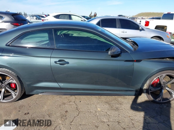 2021 Audi RS 5 z VIN WUANWAF50MA903670, wystawiony jako IAAI lot #41266483 z przebiegiem 36 200 mil mil oraz . Historia ofert i sprzedaży dostępna na DreamBid. Obrazek 13.