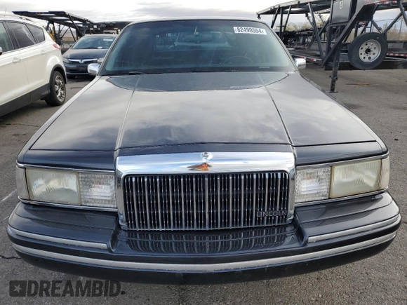 1994 Lincoln Town Car Signature z VIN 1LNLM82W6RY705395, wystawiony jako Copart lot #82490554 z przebiegiem 252 997 mil mil oraz Szkoda całkowita • Salvage title. Historia ofert i sprzedaży dostępna na DreamBid. Obrazek 5.