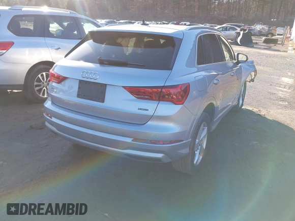 2019 Audi Q3 Premium with VIN WA1AECF3XK1069696, listed as a IAAI auction lot 41698906 with 29,713 mi miles and . Bid and sale history available at DreamBid. Image 4.