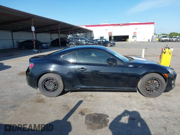 2014 Scion FR-S z VIN JF1ZNAA11E8702526, wystawiony jako IAAI lot #42068499 z przebiegiem 79 312 mil mil oraz . Historia ofert i sprzedaży dostępna na DreamBid. Obrazek 12.