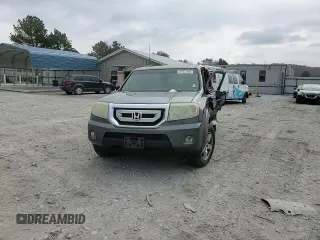 2009 Honda Pilot EX-L z VIN 5FNYF38659B015359, wystawiony jako Copart lot #81931884 z przebiegiem 256 430 mil mil oraz Szkoda całkowita • Salvage title. Historia ofert i sprzedaży dostępna na DreamBid. Obrazek 12.