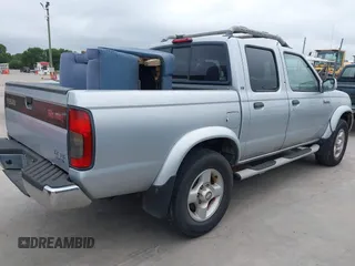 2000 Nissan Frontier XE with VIN 1N6ED27T2YC425703, listed as a IAAI auction lot 42687301 with 186,317 mi miles and . Bid and sale history available at DreamBid. Image 4.