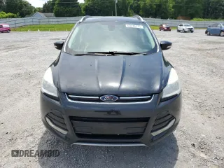 2014 Ford Escape Titanium с VIN 1FMCU0J9XEUA27152, выставлен на аукционе Copart как лот 60246715 с пробегом 182 550 миль миль и Чистый • Clean title. История ставок и продаж доступна на DreamBid. Изображение 5.