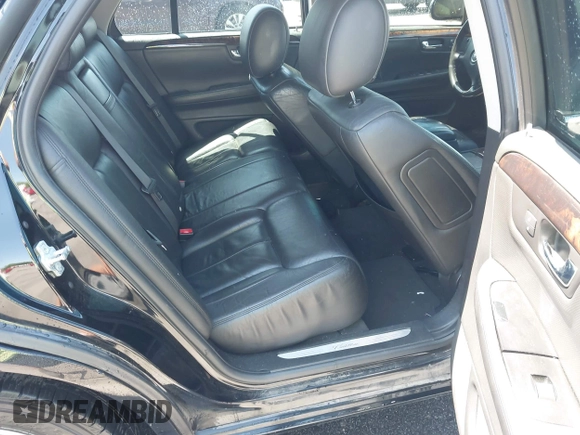 2011 Cadillac DTS Premium Collection z VIN 1G6KH5E65BU140314, wystawiony jako IAAI lot #42050040 z przebiegiem 149 921 mil mil oraz . Historia ofert i sprzedaży dostępna na DreamBid. Obrazek 8.