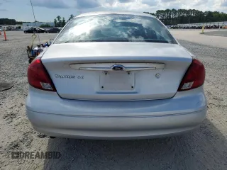 2003 Ford Taurus SE с VIN 1FAHP53233G244946, выставлен на аукционе Copart как лот 61238665 с пробегом 62 315 миль миль и Чистый • Clean title. История ставок и продаж доступна на DreamBid. Изображение 6.