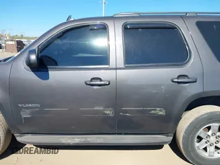 2011 GMC Yukon SLE with VIN 1GKS2AE04BR207818, listed as a IAAI auction lot 40669731 with 312,959 mi miles. Bid and sale history available at carsss.com. Image 14.