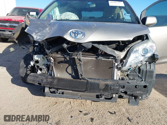 2015 Toyota Sienna XLE with VIN 5TDYK3DC8FS547056, listed as a IAAI auction lot 41387793 with 140,767 mi miles and . Bid and sale history available at DreamBid. Image 6.