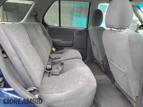 2002 Isuzu Rodeo S with VIN 4S2CK58W124301647, listed as a Copart auction lot 56973895 with 129,009 mi miles and Salvage title. Bid and sale history available at DreamBid. Image 11.